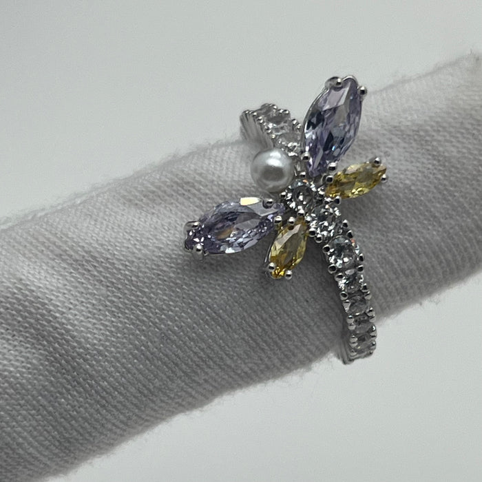 Swarovski Dragonfly Ring(small /medium )
 Color: Silver and Multicolored (featuring pastel purple, yellow, clear crystals, and a white crystal pearl)