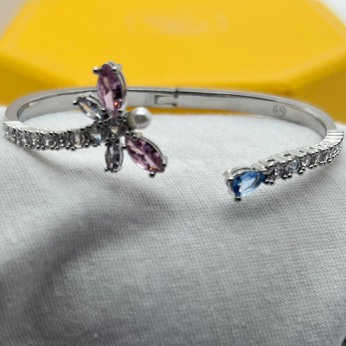 Swarovski Idyllia Butterfly & Pearl Open Bangle / Crystal Insect Cuff  
 Color: Silver-tone with pink, white (crystals and crystal pearl), and pale blue stones