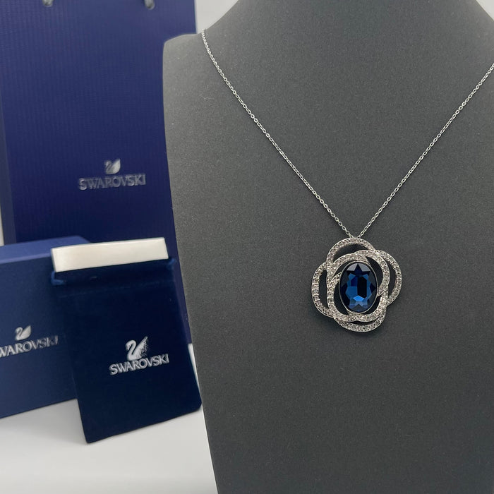 Swarovski Eternal Flower / Florere Pendant 
 Color: Silver, Clear, and Ruby Red/Midnight Blue