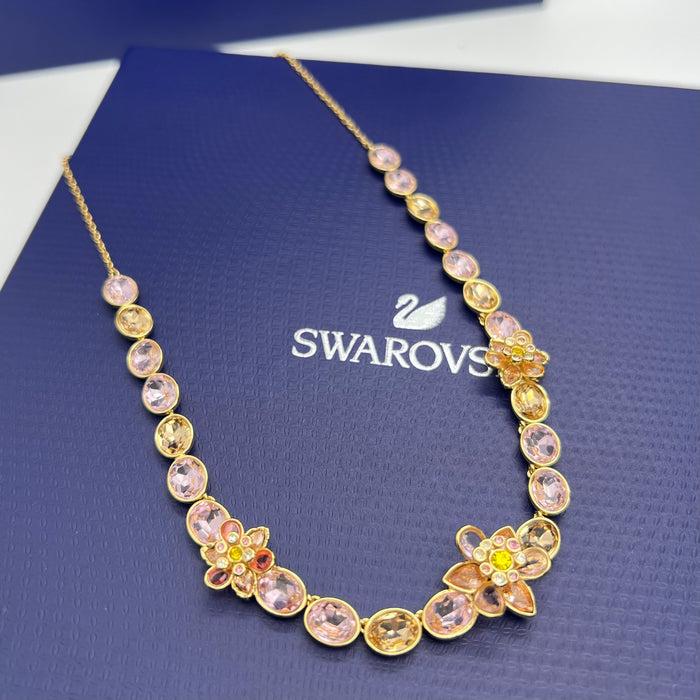 Name: Idyllia Floral Strand Necklace / Crystal Flower Line Necklace  
 Color: Gold-tone with soft pink, champagne, and green crystals