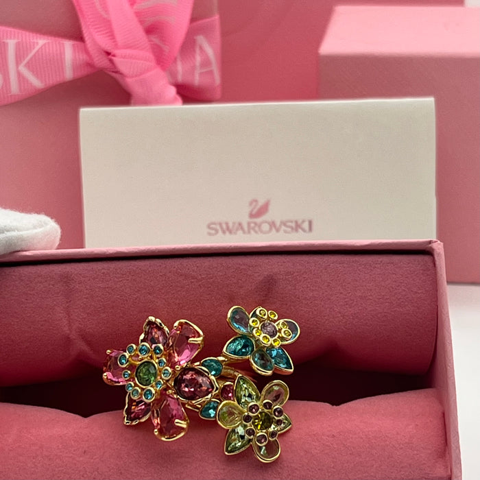 Swarovski Idyllia Cluster Flower Ring  
 Color: Multicolored (featuring vibrant shades of pink, turquoise blue, olive green, and yellow)