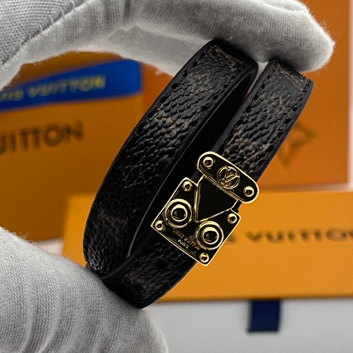 Louis Vuitton Monogram Trunk Double Bracelet  
 Color: Brown / Black / White