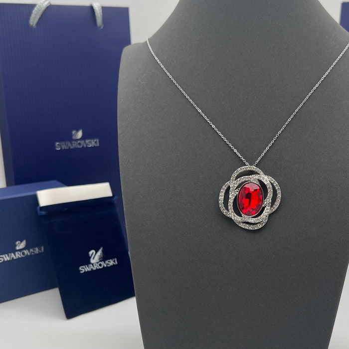 Swarovski Eternal Flower / Florere Pendant 
 Color: Silver, Clear, and Ruby Red/Midnight Blue