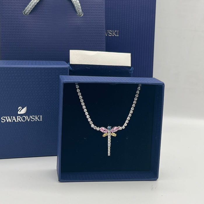 Swarovski Mixed Cuts Dragonfly Tennis Necklace
 Color: Multicolored (Silver-tone chain with clear, pastel pink, purple, yellow, and blue crystal accents)