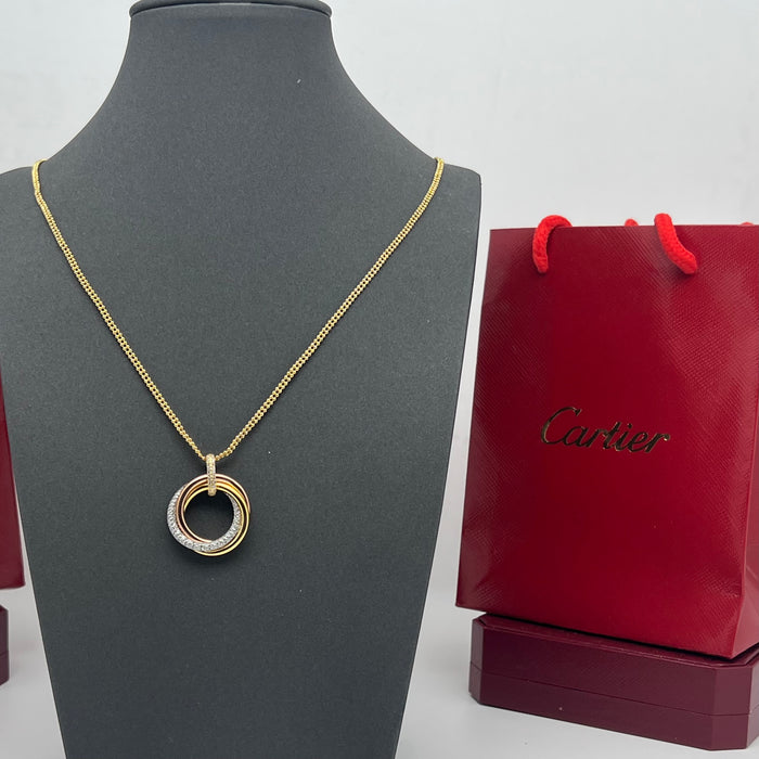 Trinity Necklace  
 Color: Gold / Multi-gold tones