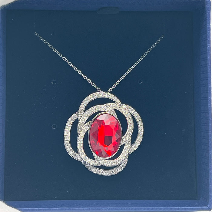 Swarovski Eternal Flower / Florere Pendant 
 Color: Silver, Clear, and Ruby Red/Midnight Blue