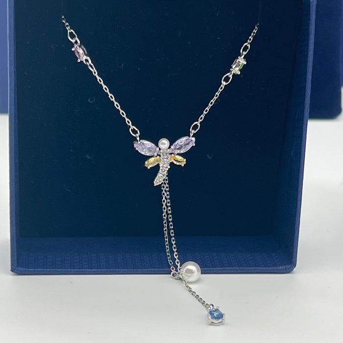 Swarovski Mixed Cuts Dragonfly Y-Necklace  
 Color: Multicolored (Silver-tone chain with pastel pink, purple, yellow, white pearl, and blue crystal accents