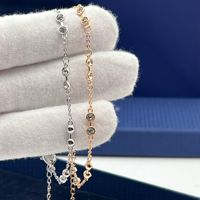 Swarovski Stranded Station Bracelet
 Color: Silver-tone and Rose Gold-tone with bezel-set clear crystals