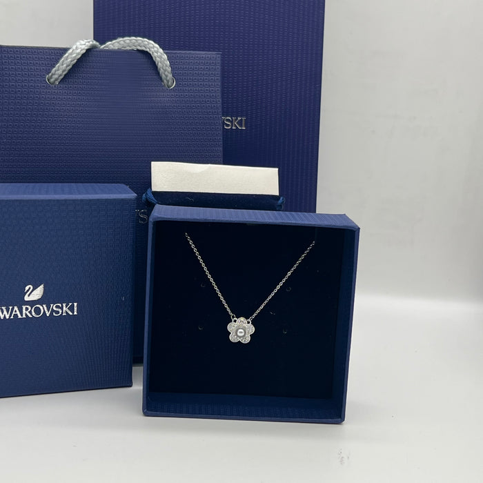 Swarovski Floral Pearl Pendant Necklace  
 Color: Silver with a white crystal pearl and clear crystal pavé