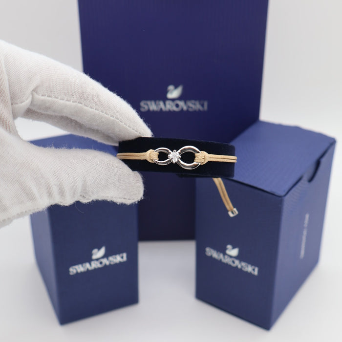 Swarovski Infinity Cord Bracelet – Beige Adjustable Band with Crystal Centerpiece - 5533725