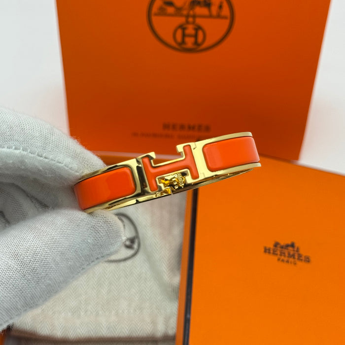 Hermès Clic H Enamel Bracelet – Gold-Rose-Silver Tone Finish