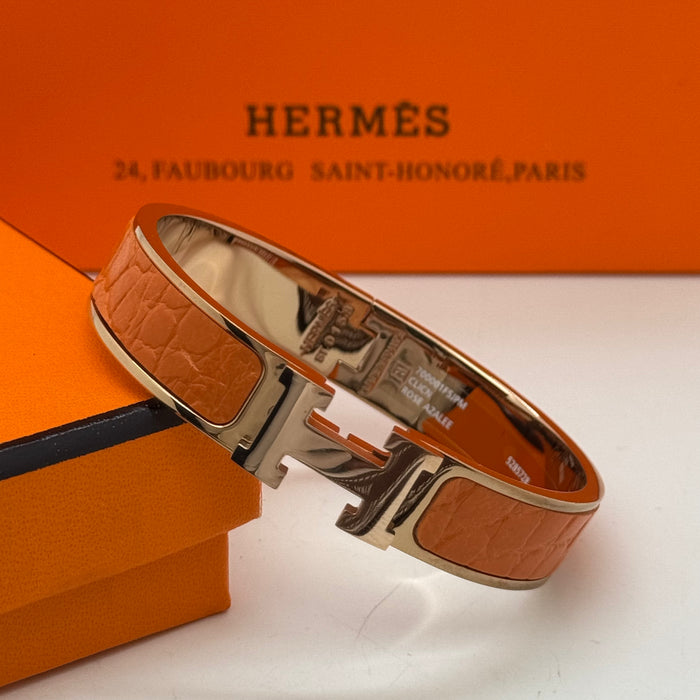 Hermès Clic H Leather Bracelet – Gold & Rose Gold Tone