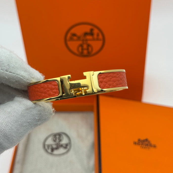 Hermès Clic H Leather Bracelet – Gold & Rose Gold Tone