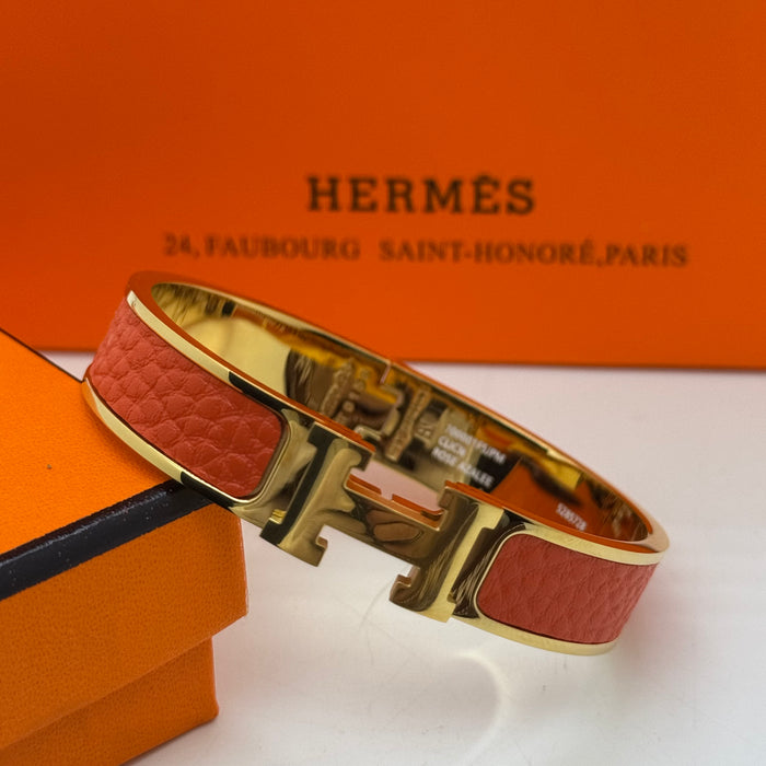 Hermès Clic H Leather Bracelet – Gold & Rose Gold Tone