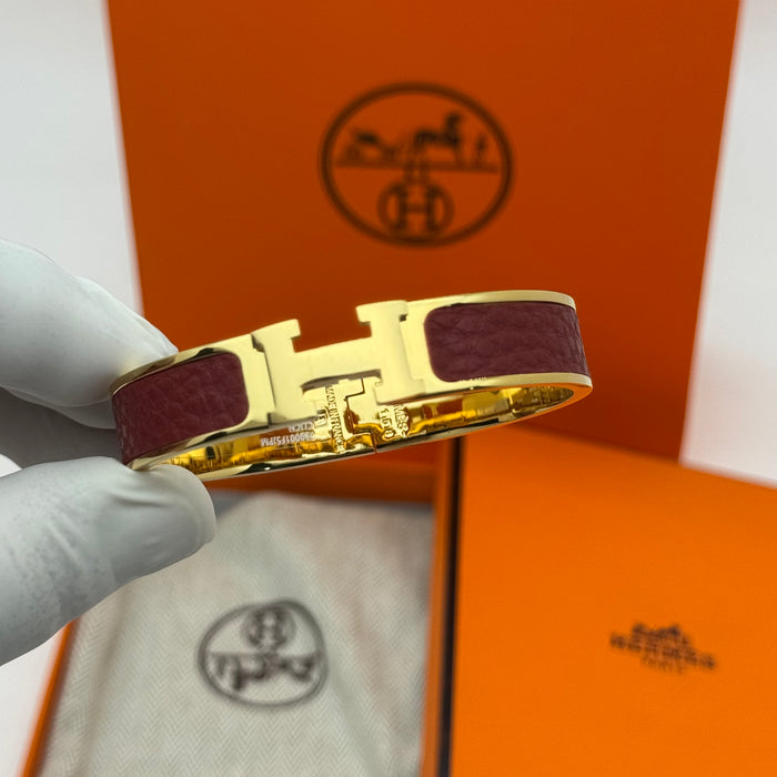 Hermès Clic H Leather Bracelet – Gold & Rose Gold Tone