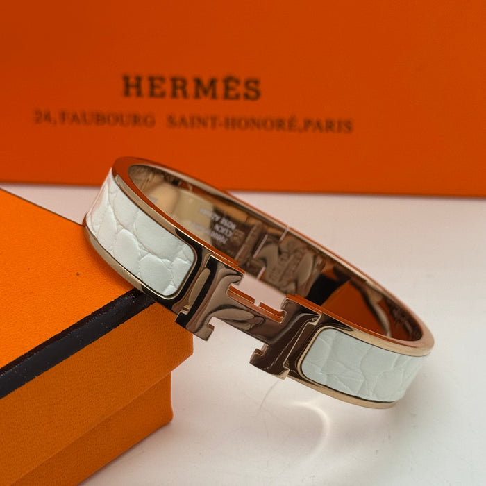Hermès Clic H Leather Bracelet – Gold & Rose Gold Tone
