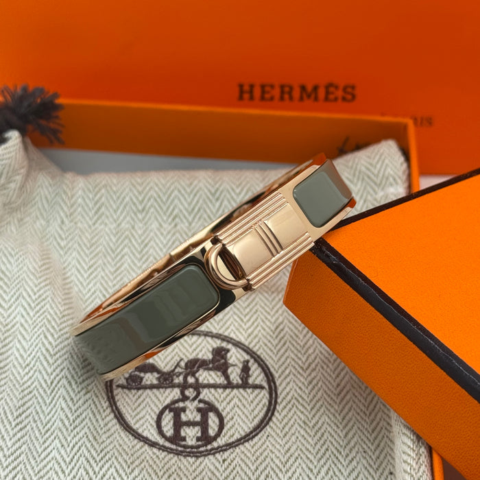 Hermès Rivale Enamel Bracelet – Gold / Palladium Finish
