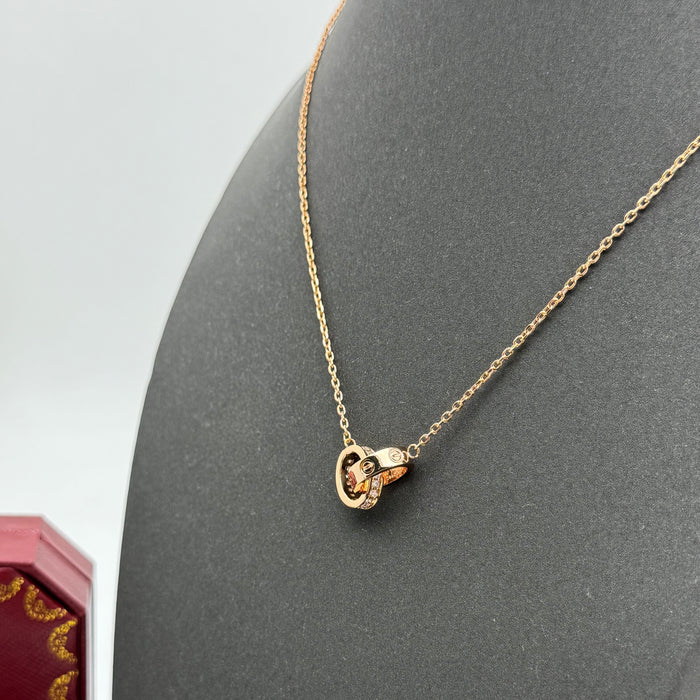 Cartier Double Love Rings Necklace – Interlocking Pendant (Gold, Silver, Rose Gold)
