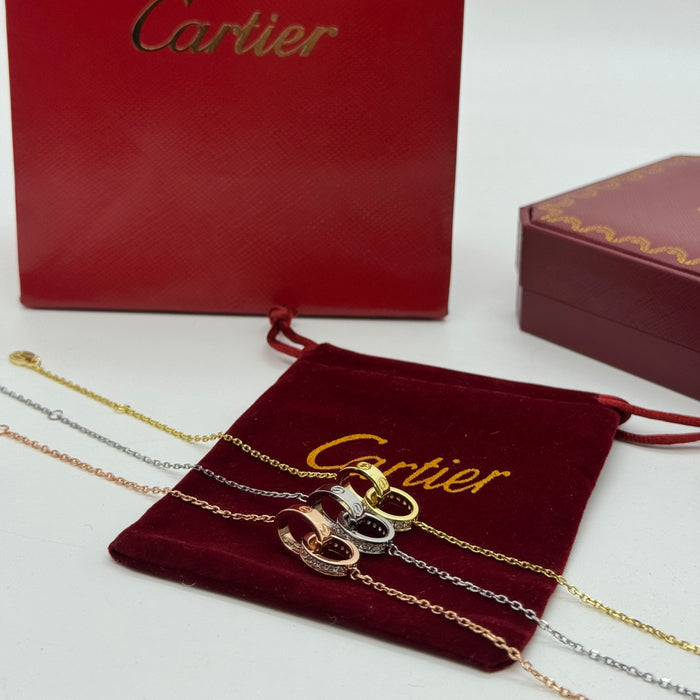 Cartier Double Love Rings Bracelet – Interlocking Design (Gold, Silver, Rose Gold)