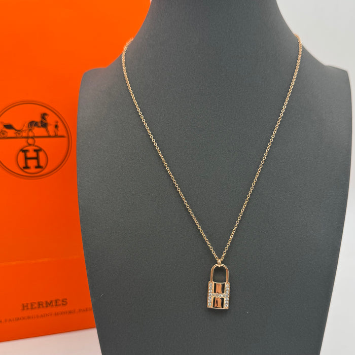 Hermès Kelly Lock Necklace in Gold-Silver & Rose Gold with Crystal “H” Pendant
