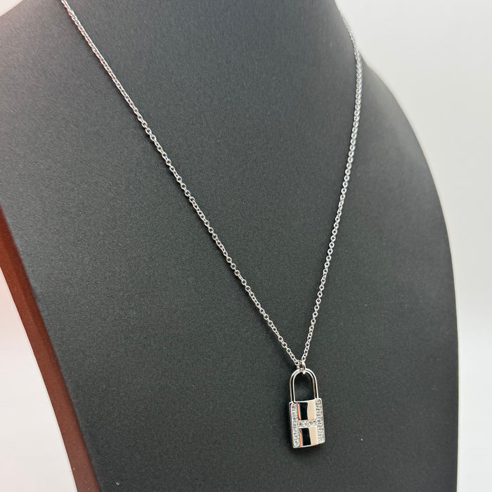 Hermès Kelly Lock Necklace in Gold-Silver & Rose Gold with Crystal “H” Pendant