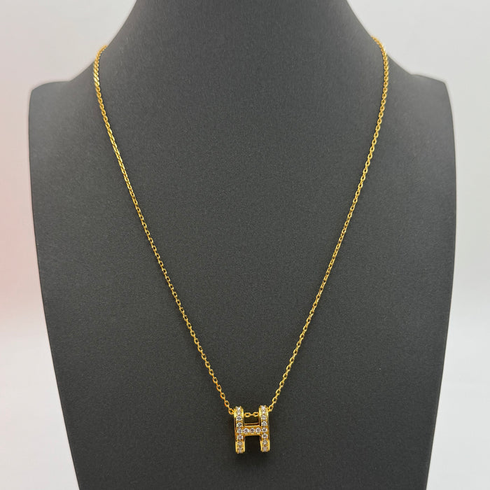 Hermès “H” Diamond Pavé Pendant Necklace — Gold & Rose Gold
