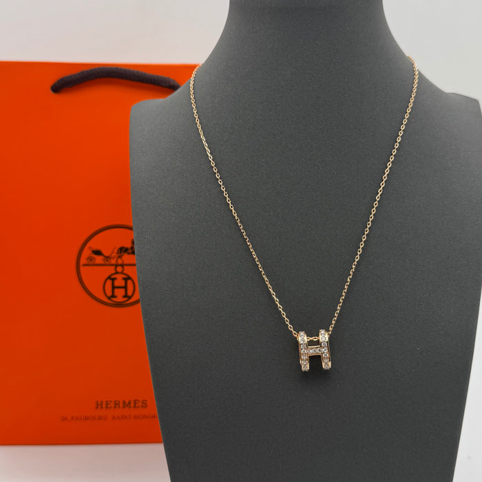 Hermès “H” Diamond Pavé Pendant Necklace — Gold & Rose Gold