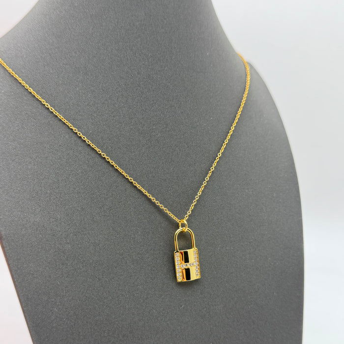 Hermès Kelly Lock Necklace in Gold-Silver & Rose Gold with Crystal “H” Pendant